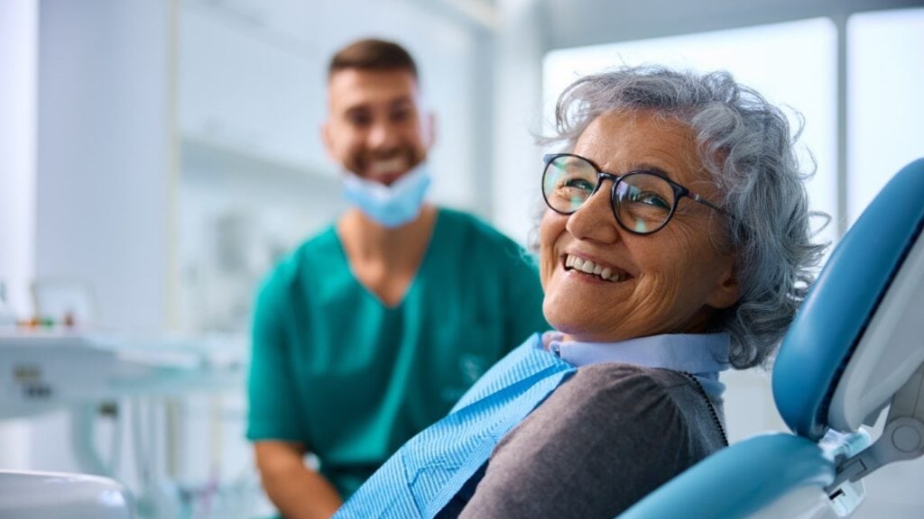 Senior patient in dentist chair.